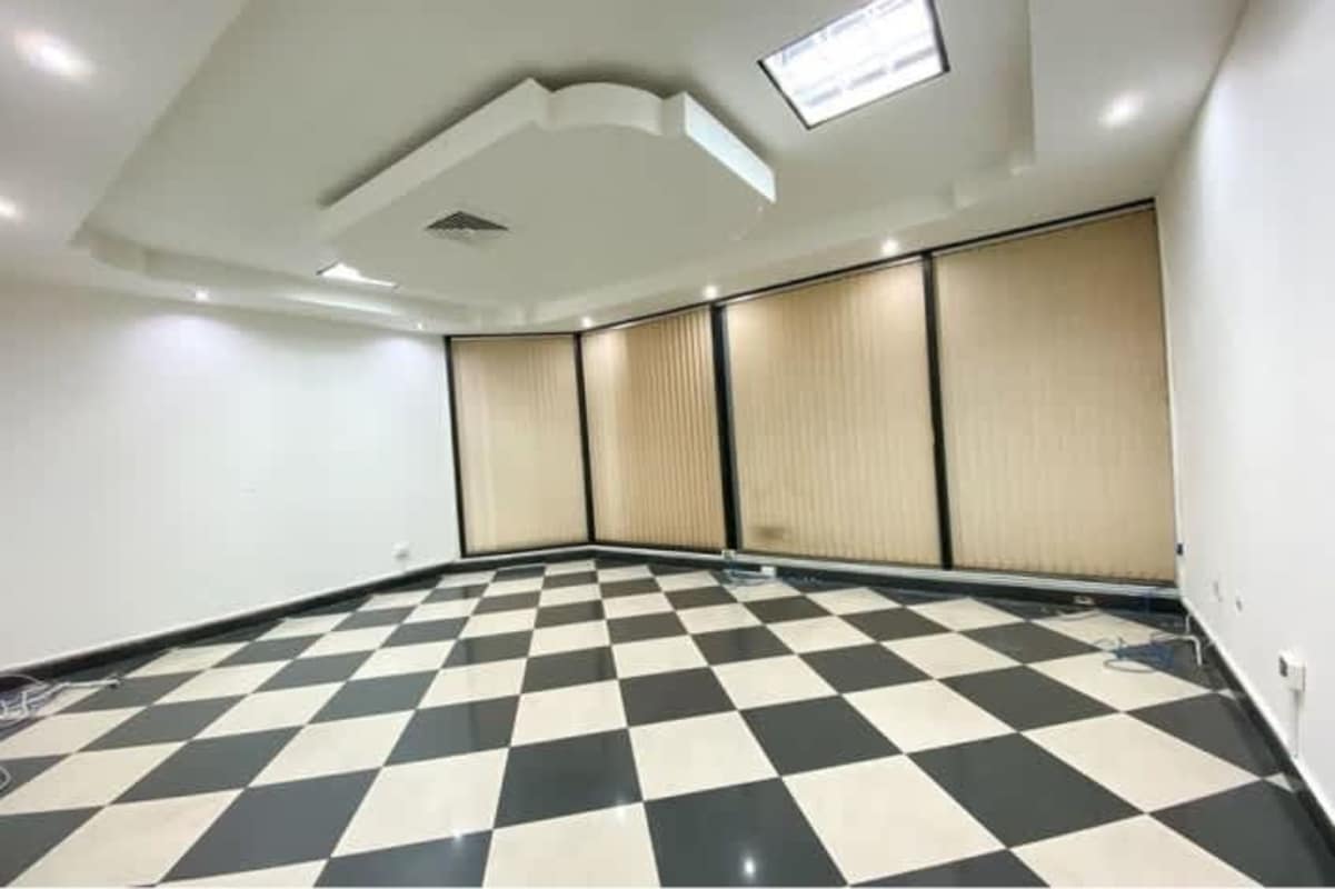 Bright empty office space with tile floors, suspended ceiling for rent PH BICSA Tower Panama