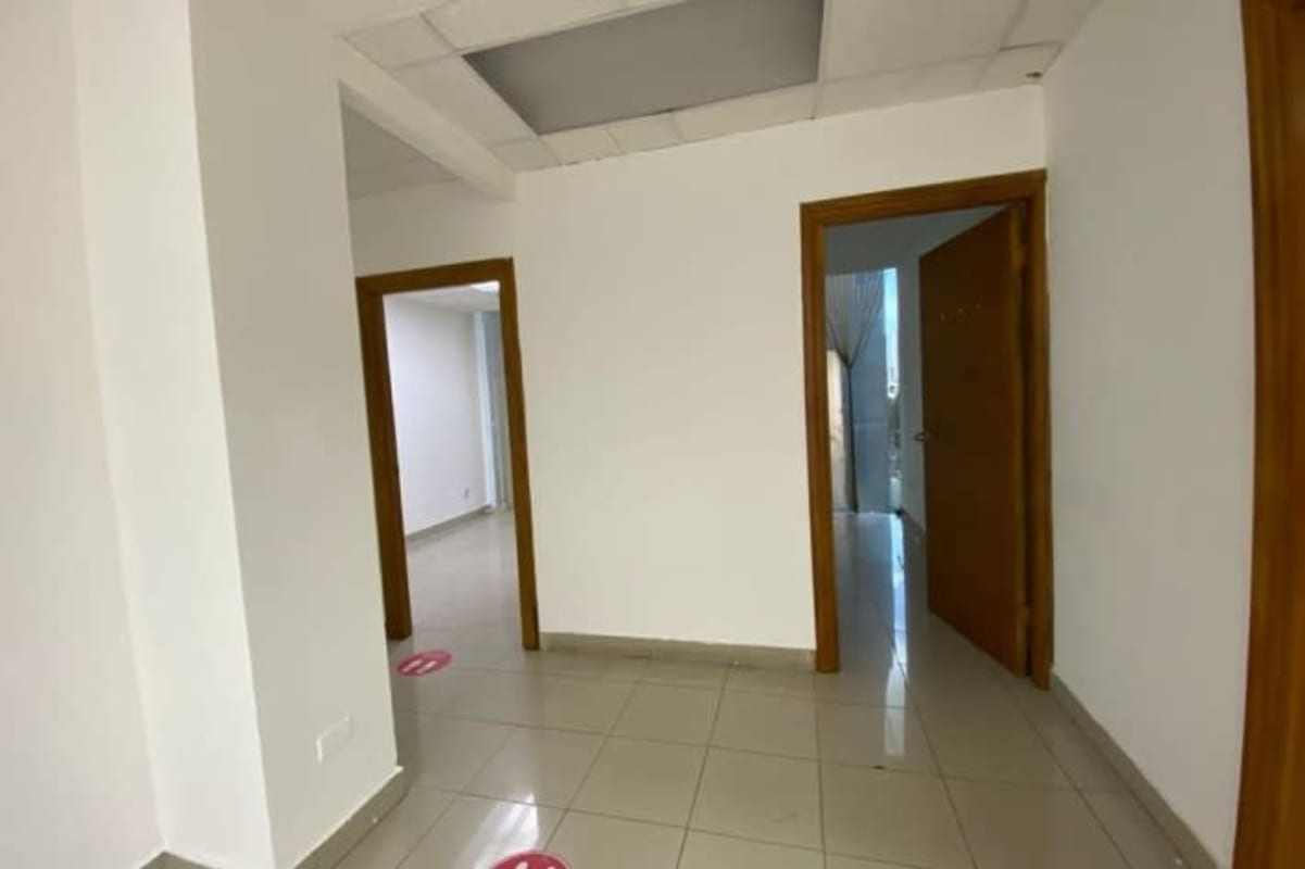 Minimalist hallway with tiled floor, doors and access to various office suites PH BICSA Tower Panama