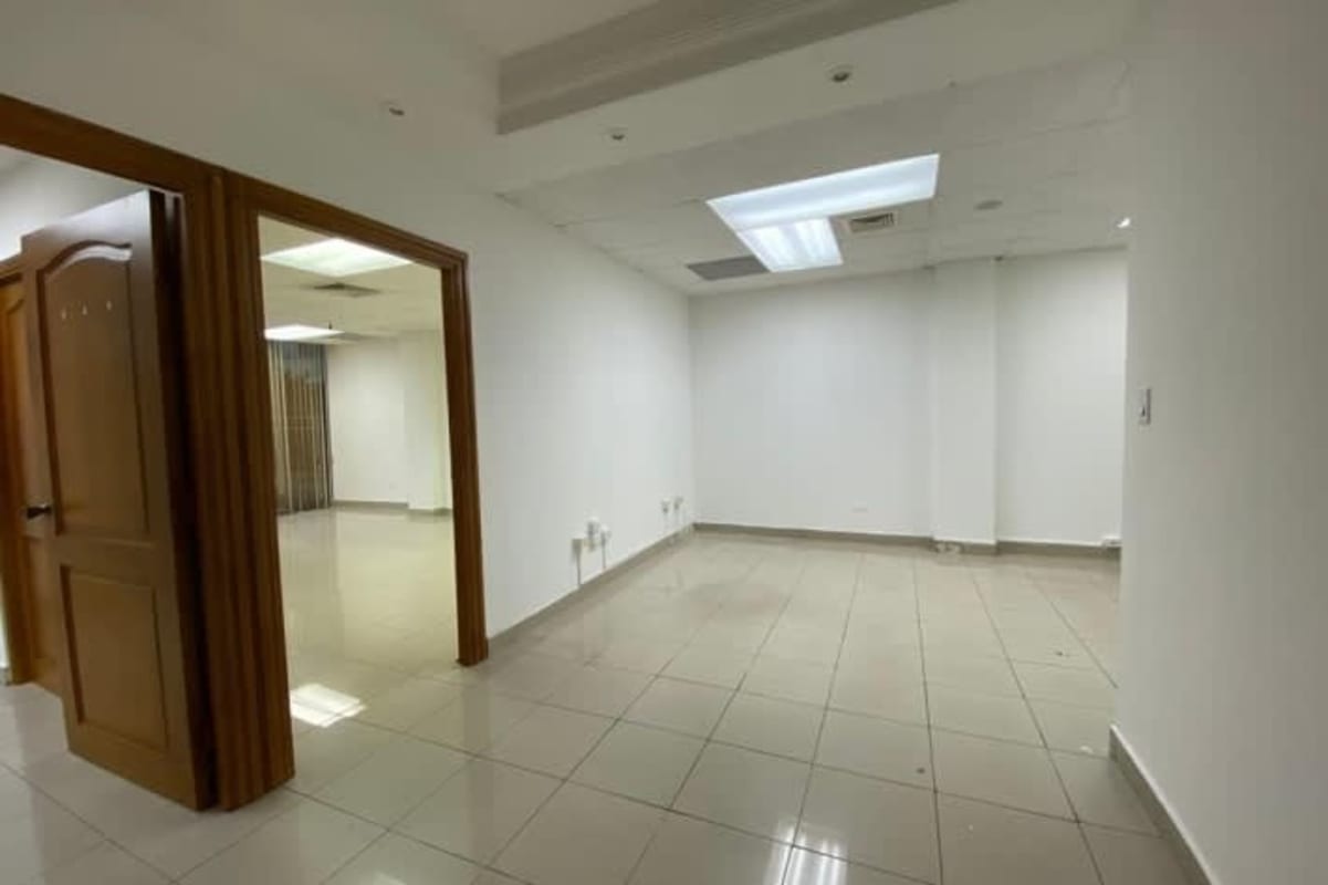 Modern empty office with tiled floor, fluorescent lighting at PH BICSA Tower Obarrio