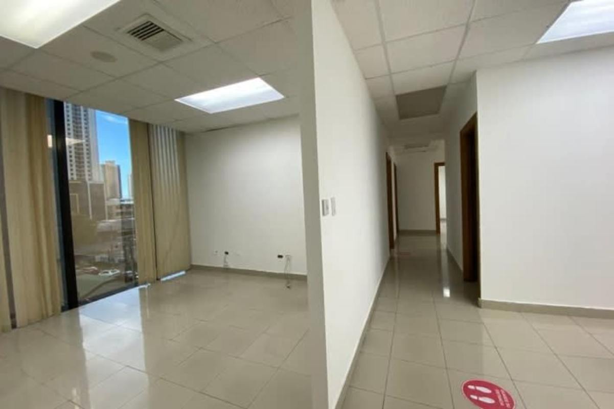 Corporate office with floor-to-ceiling windows panoramic Panama City skyline inside PH BICSA Tower