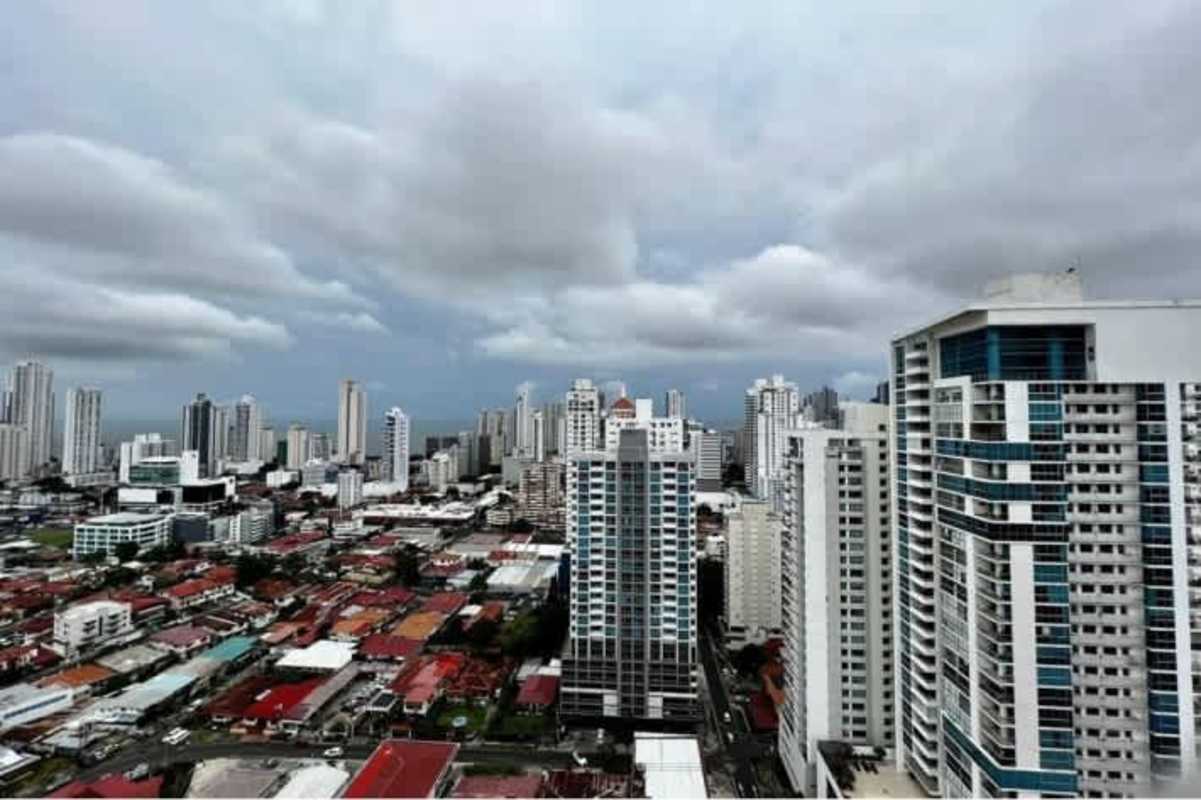 Remodeled kitchen with granite countertops, gas stove, appliances in PH San Francisco Bay apartment Panama City