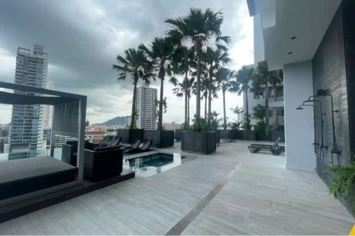 Sky club level infinity pool with cabanas city skyline view Nuovo Residences Panama City