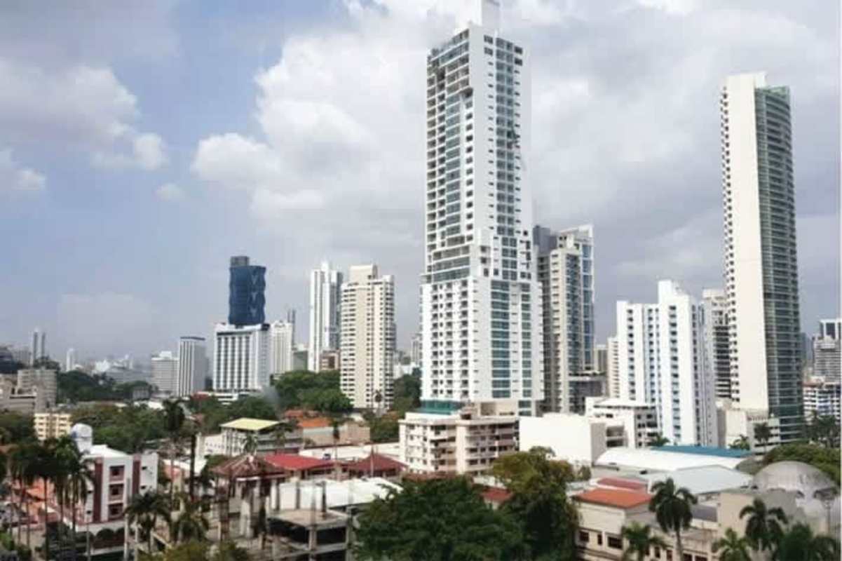 Panoramic city skyline view with modern high-rises from rooftop at PH Azurre 42