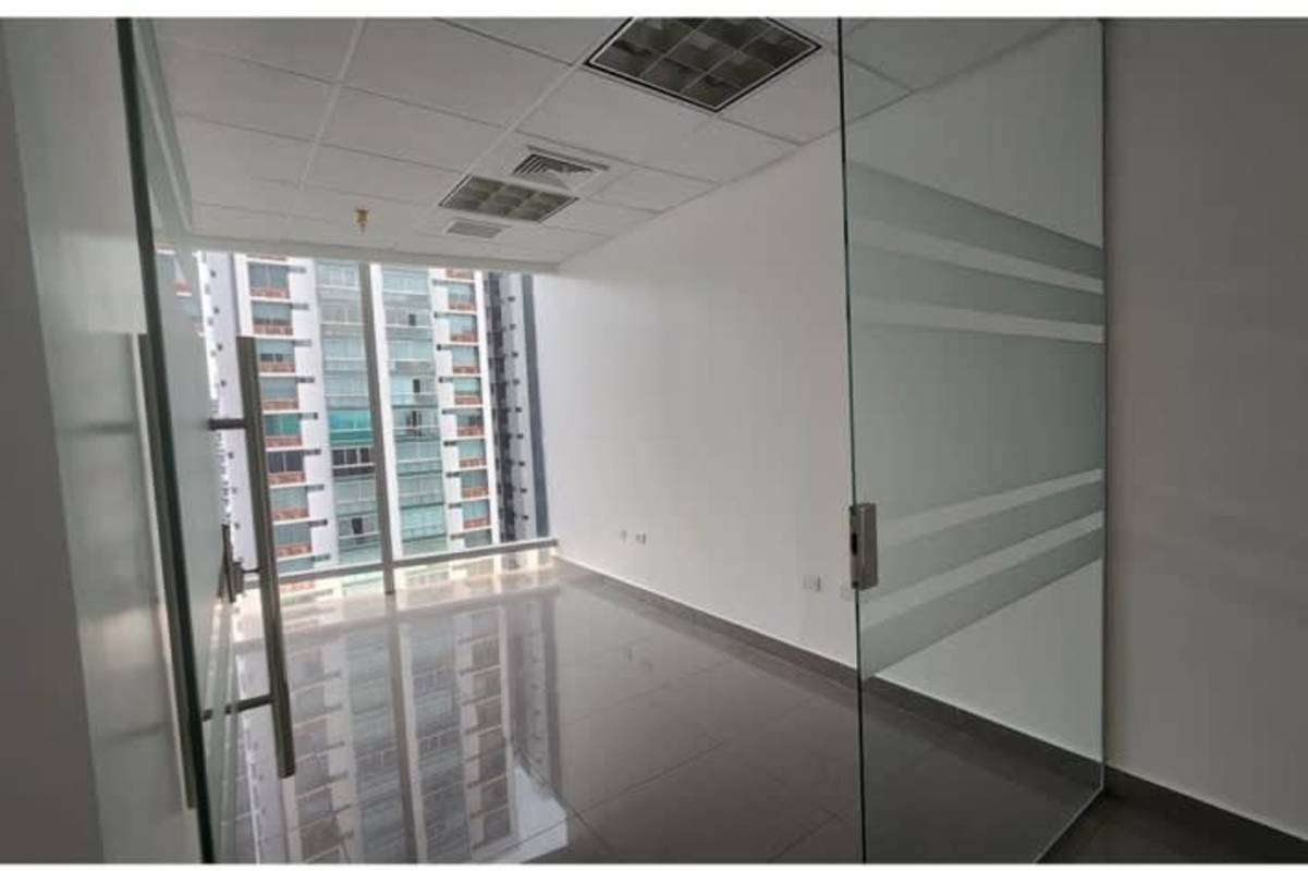 Conference room with glass walls inside corporate office at PH Aseguradora Ancón Costa del Este