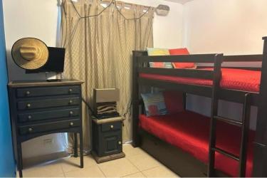 Functional small bedroom with bunk bed and dresser Ibiza Residences Bijao Panama beach villa