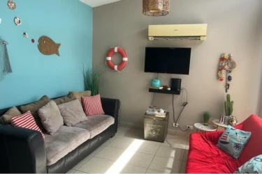 Bedroom with bunk beds, tiled floor affordable beach villa Ibiza Residences Bijao Panama