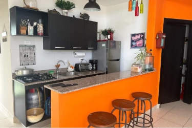 Bathroom with modern fixtures and colorful shower curtain Ibiza Residences Panama