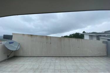 Spacious master bedroom with walk-in closet, balcony, floor-to-ceiling windows in Panama Pacifico apartment