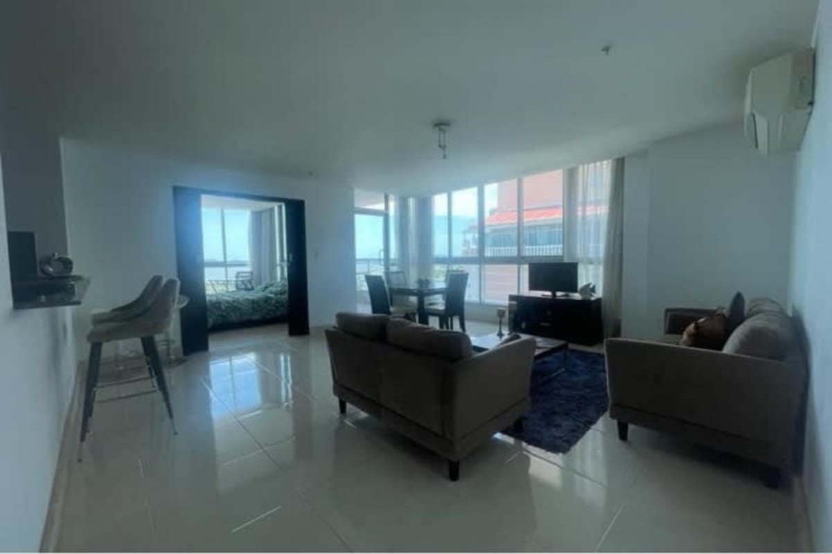 Spacious open-concept living dining room with city views in PH Villa del Mar Panama City