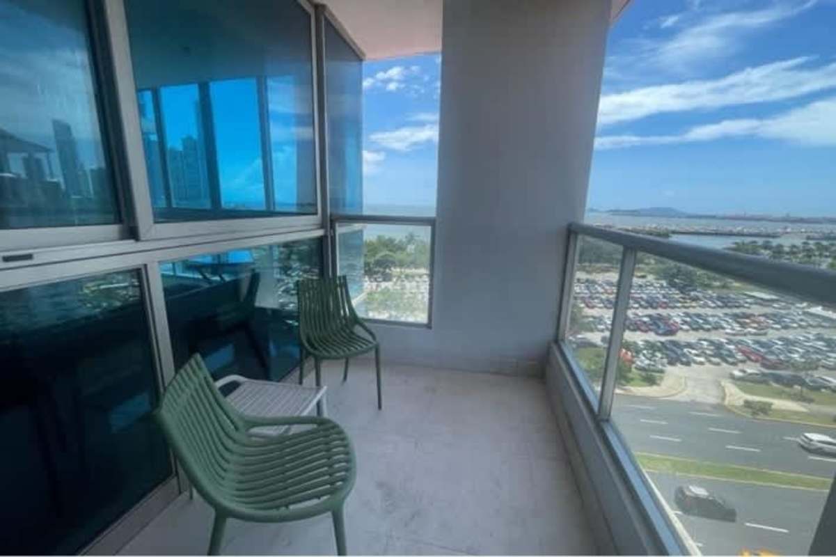Glass railing balcony with stunning waterfront city views at PH Villa del Mar Panama