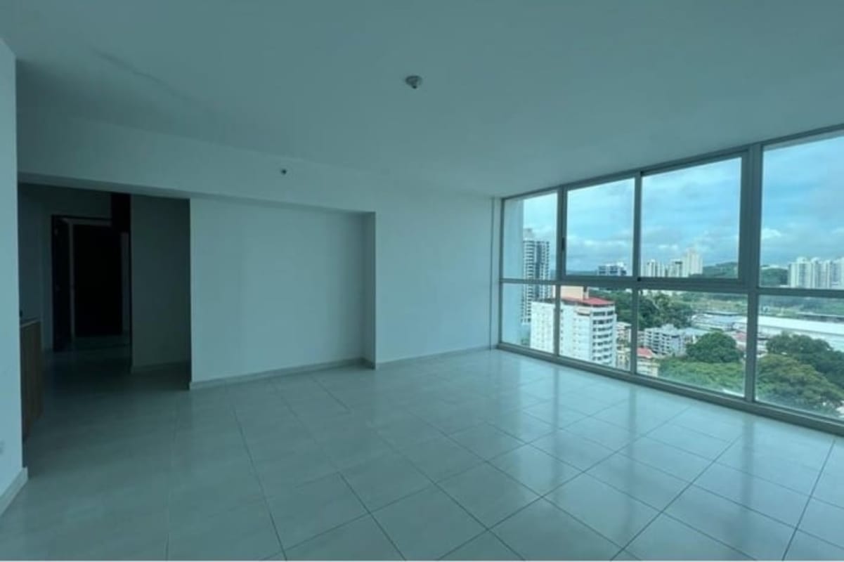 Modern living room with large windows, city skyline views in PH El Cangrejo Panama