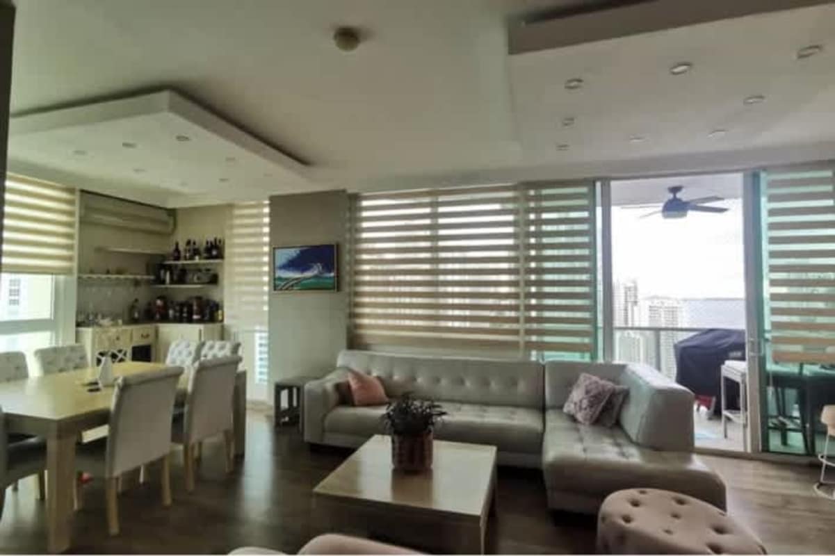 Luxury master bedroom with floor to ceiling windows ocean view in PH Aqualina Panama City