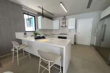 Stylish modern kitchen with stainless appliances and quartz counters in Explora Panama Pacifico