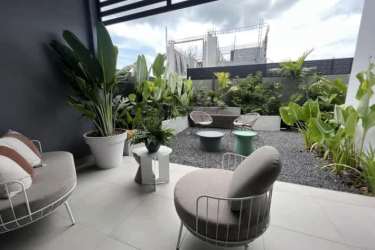 Bright modern bedroom with large window eco friendly home Imaterra Panama Pacifico