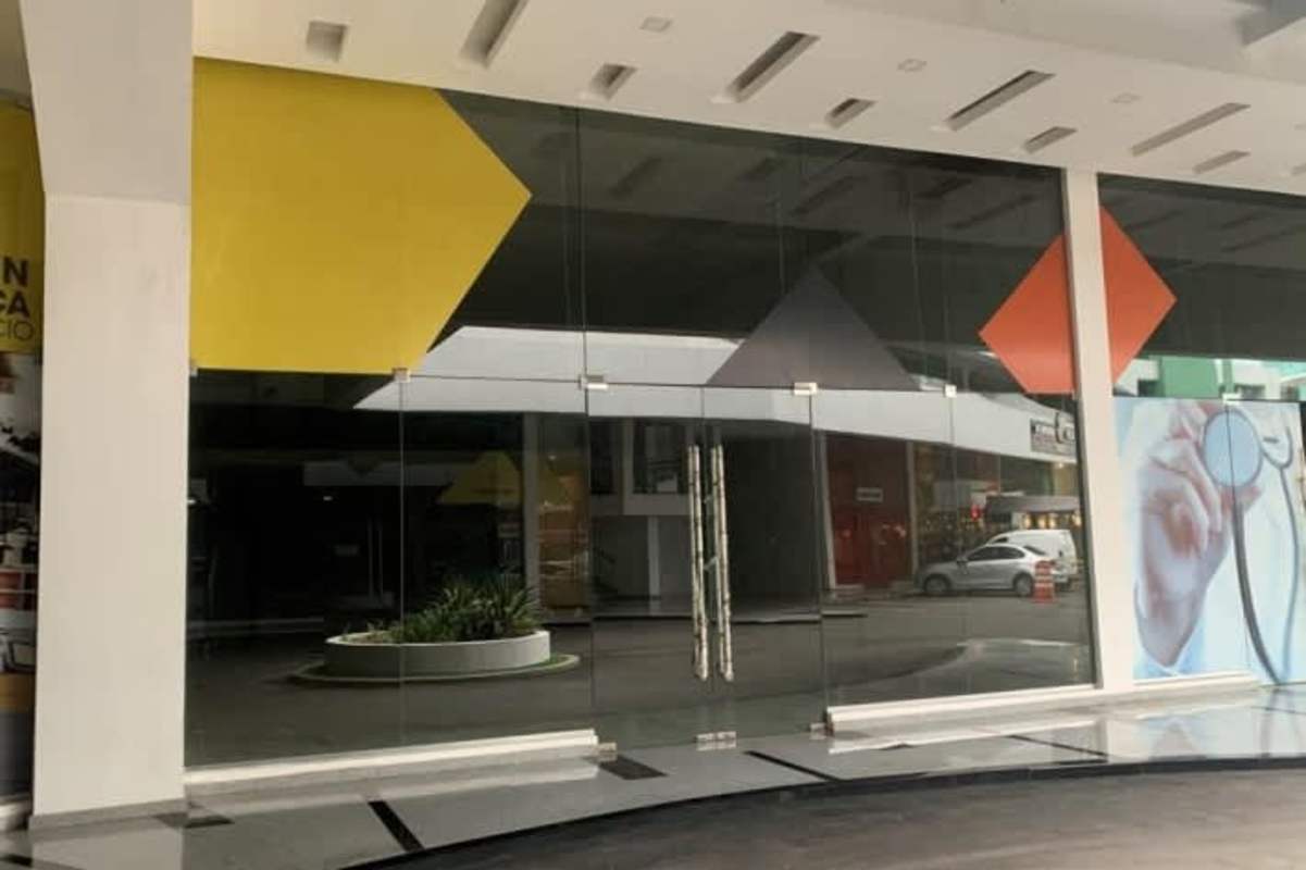 Spacious grey work shell retail or office space with concrete walls and ceiling Via Brasil Obarrio Panama