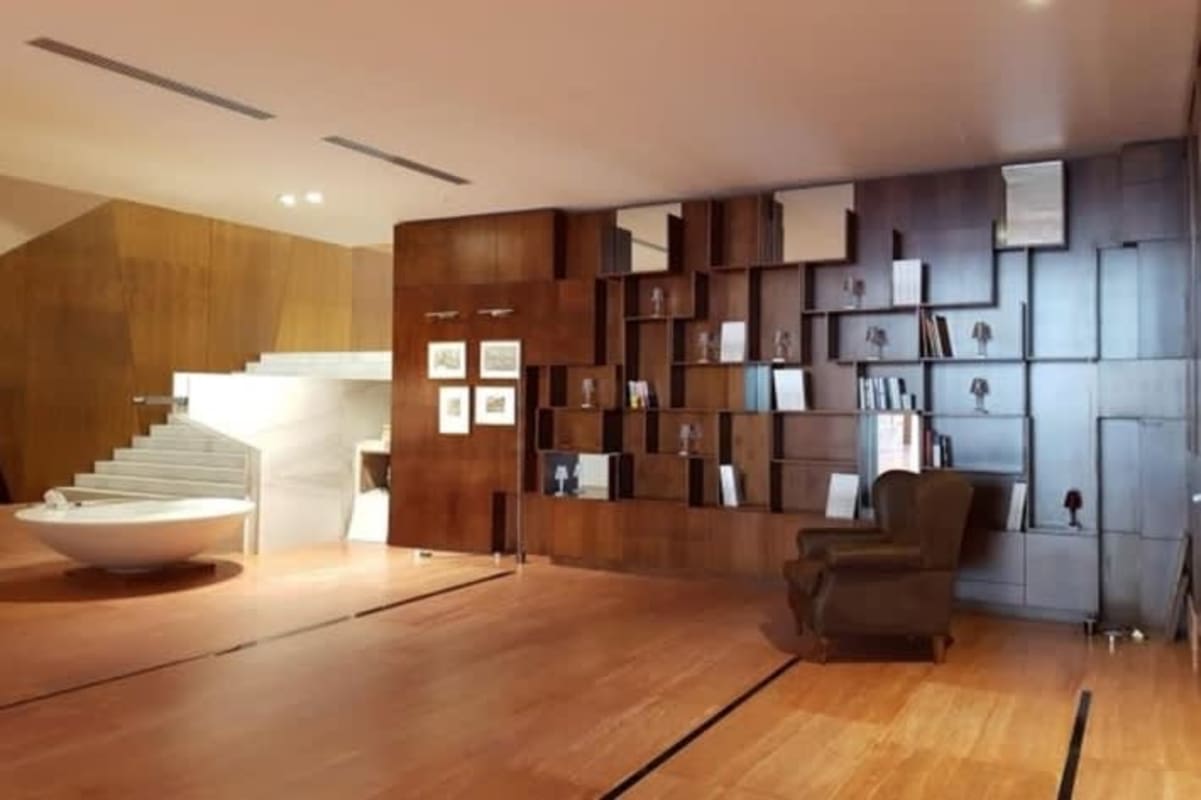 Infinity rooftop pool with sun loungers and city skyline views at PH The Palace Bella Vista Panama