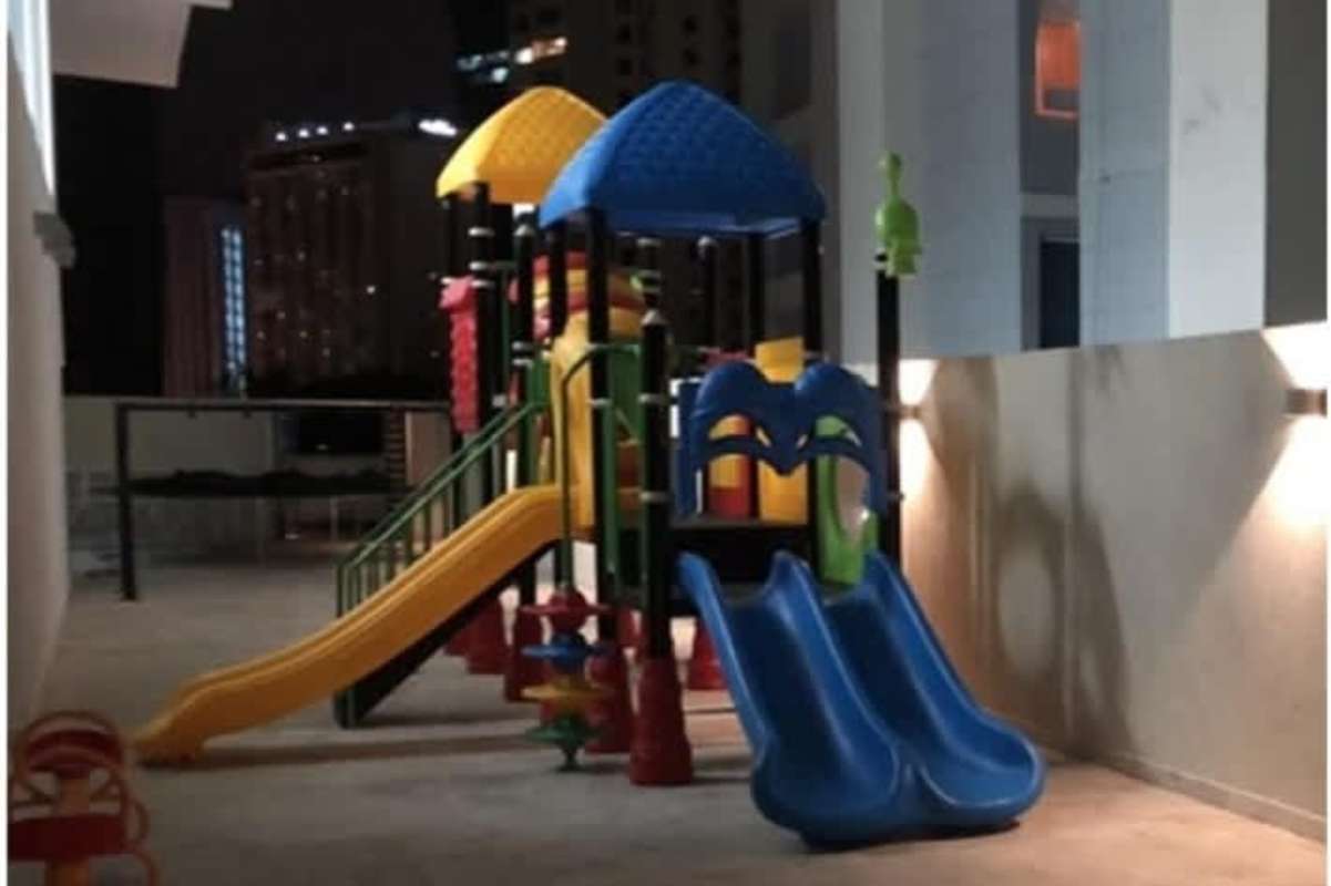 Illuminated outdoor playground with slides at PH The Palace Bella Vista Panama City