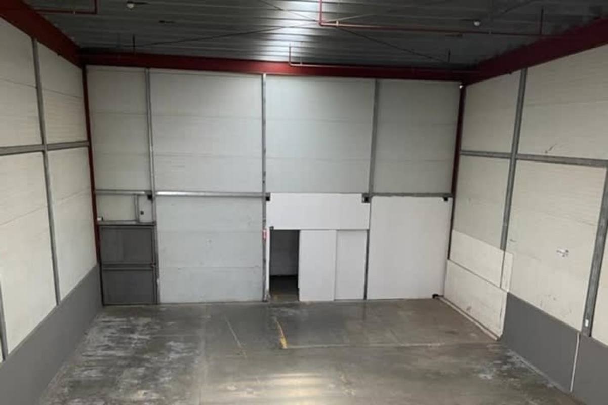 Exterior of multiple warehouse units with loading docks and delivery trucks Tocumen Panama