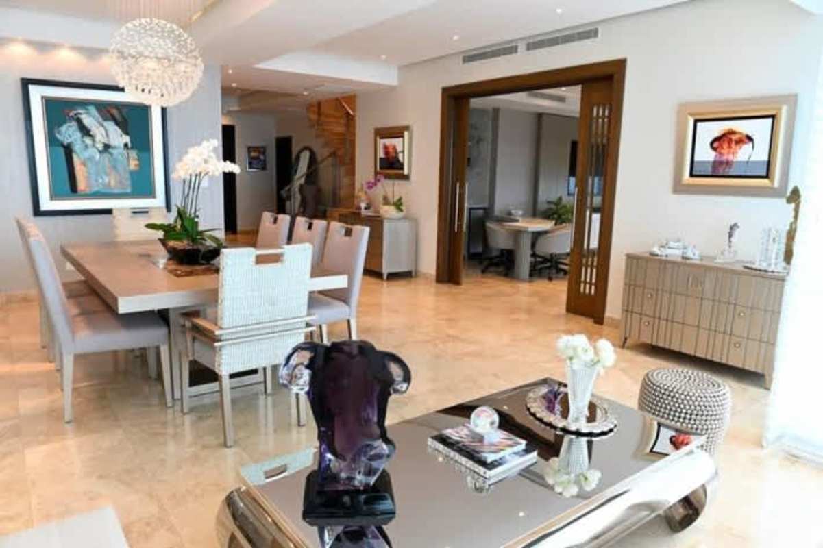 Fully equipped kitchen with granite countertops and modern appliances in PH Titanium Costa del Este penthouse