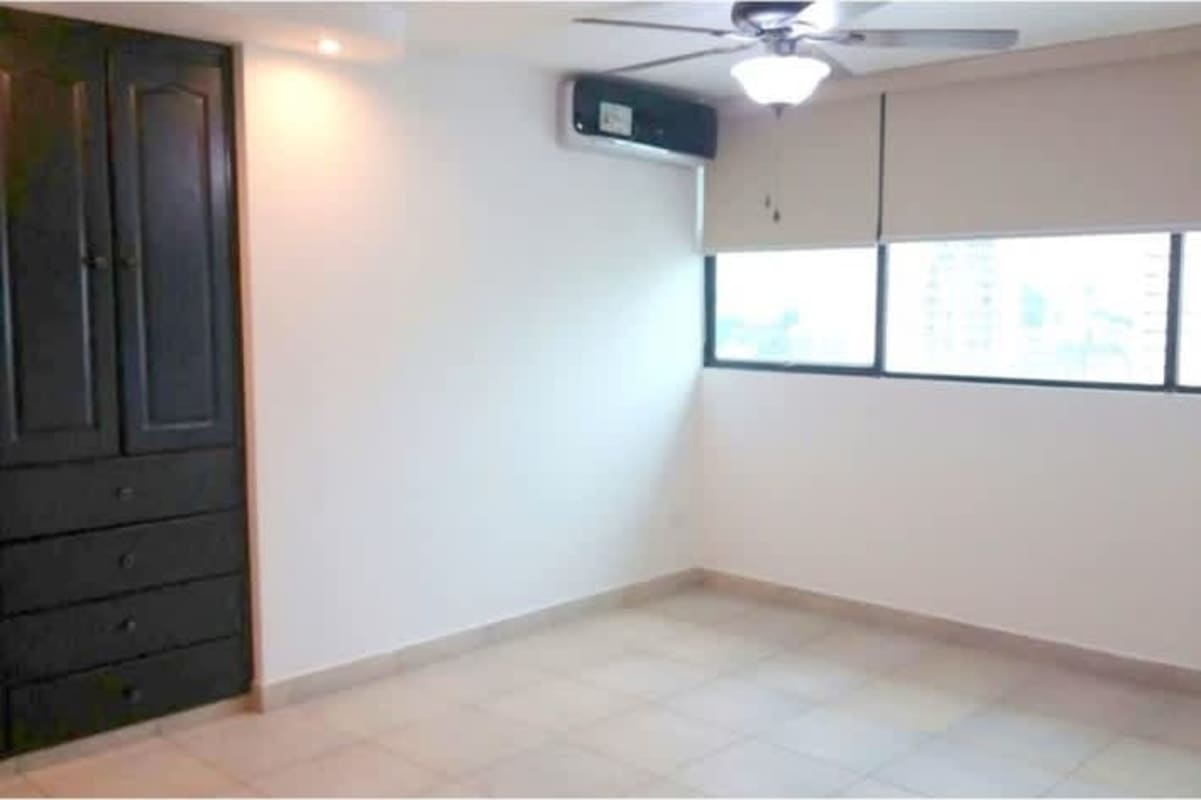 Spacious living room with big windows and balcony in PH Torre Cosmos Obarrio Panama City