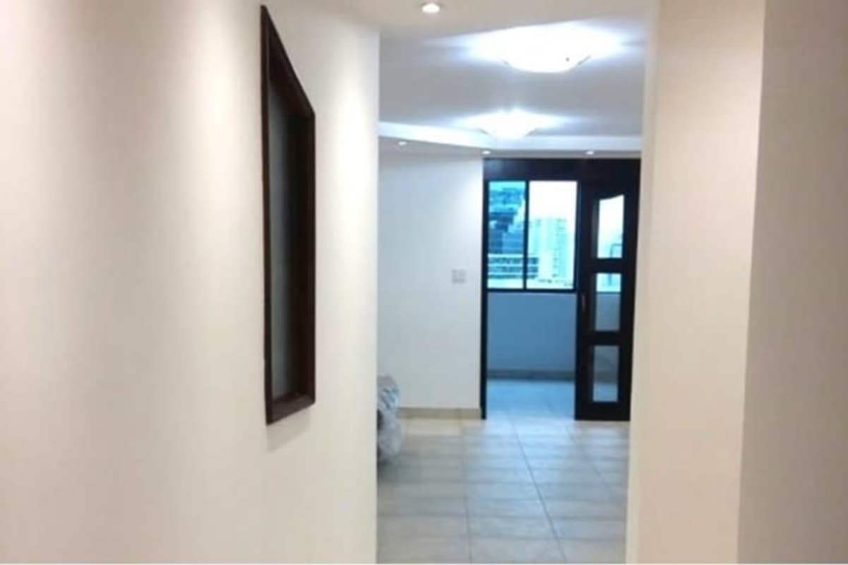 Bedroom with built-in closet and window Obarrio Panama apartment PH Torre Cosmos