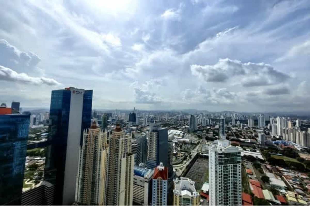 Bedroom with large windows panoramic city views PH Dupont Punta Pacífica Panama