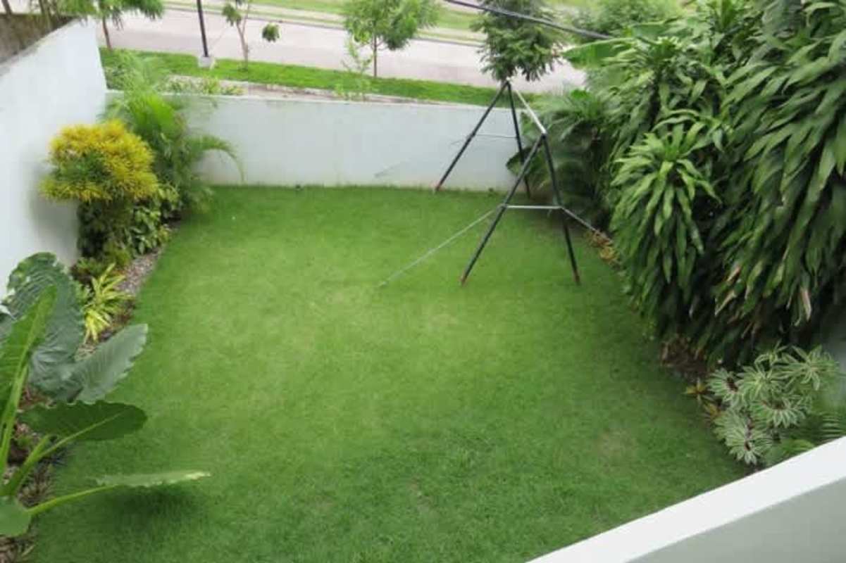 Kitchen with blue cabinetry, stainless appliances, breakfast bar in Altos de Panamá