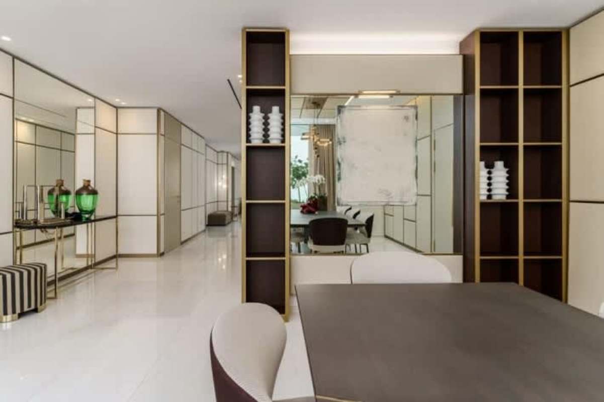 Modern spacious living room marble finish panoramic windows in La Maison by Fendi Casa