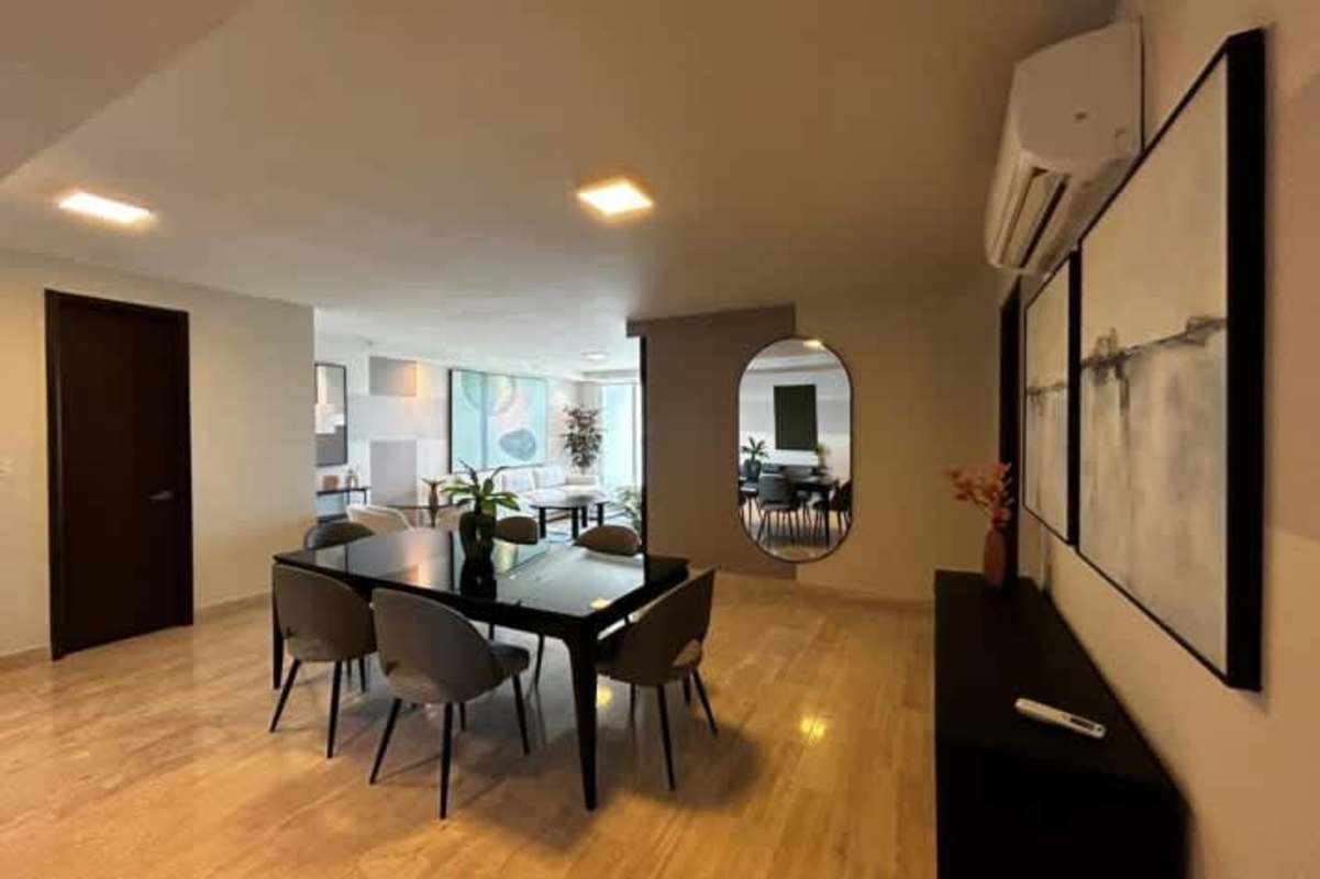 Modern bedroom with city view, en-suite bathroom at The Regent Costa del Este