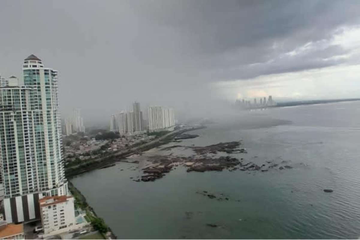 Children's outdoor playground with slide, swings in luxury condo PH Ocean Club Panama City