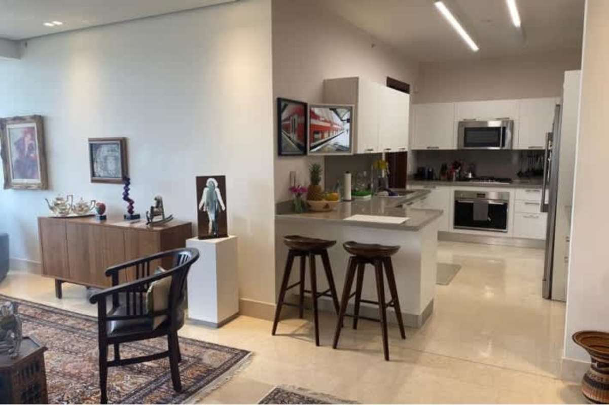 Dining space with panoramic windows and terrace access in PH Greenview Santa María Panama