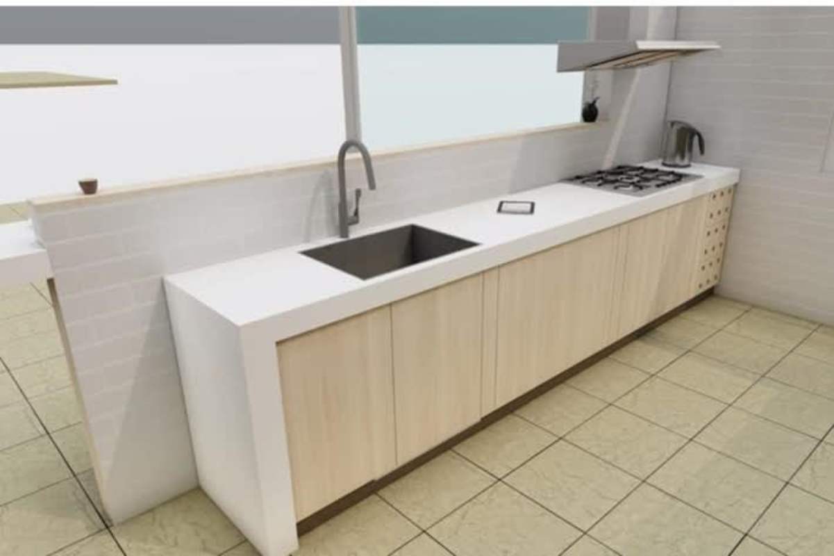 Modern kitchen with granite countertops and light cabinetry at PH Mystic Point Panama City