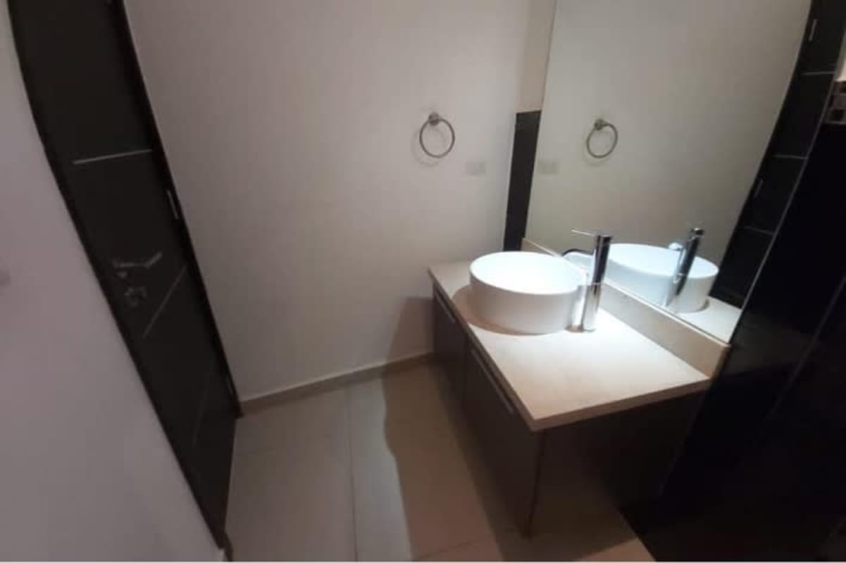 Ample covered terrace with panoramic city skyline views at PH Joy Tower Panama