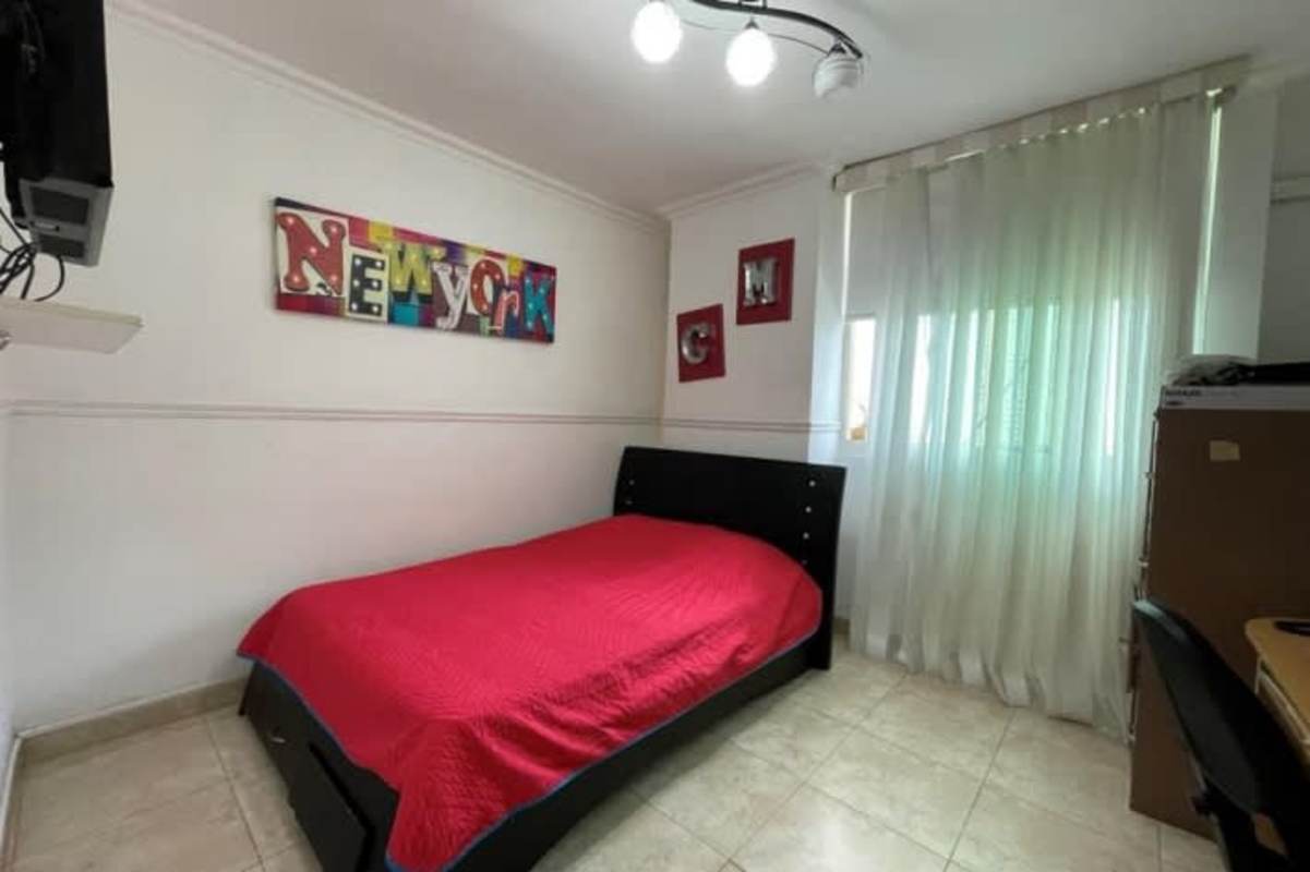 Spacious open living dining room with large windows and bright tile flooring at Mystic Point