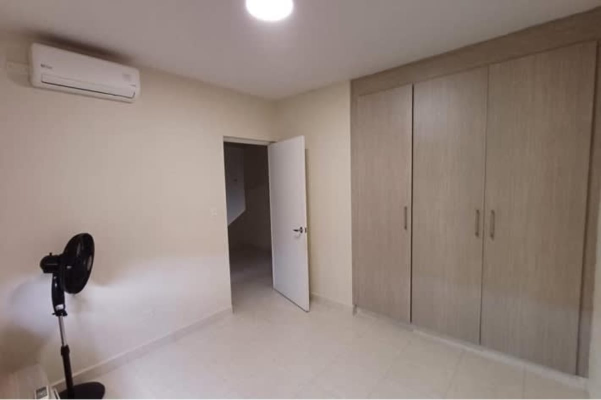 Kitchen with granite countertops, appliances, cabinetry in Versalles Panama