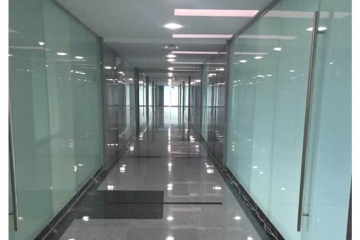 Glass corridor in commercial office building PH Via Brasil Plaza San Francisco Panama