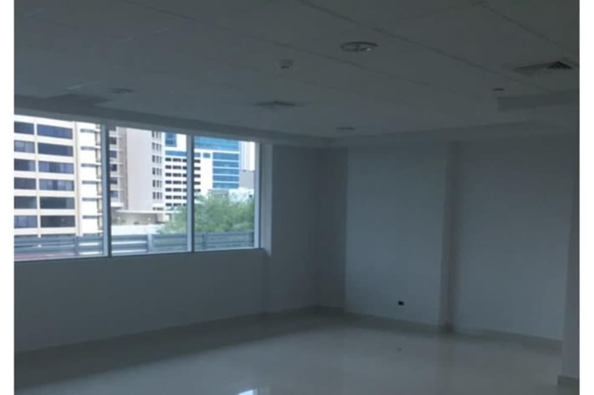 Modern open office space with city view windows PH Via Brasil Plaza commercial Panama City