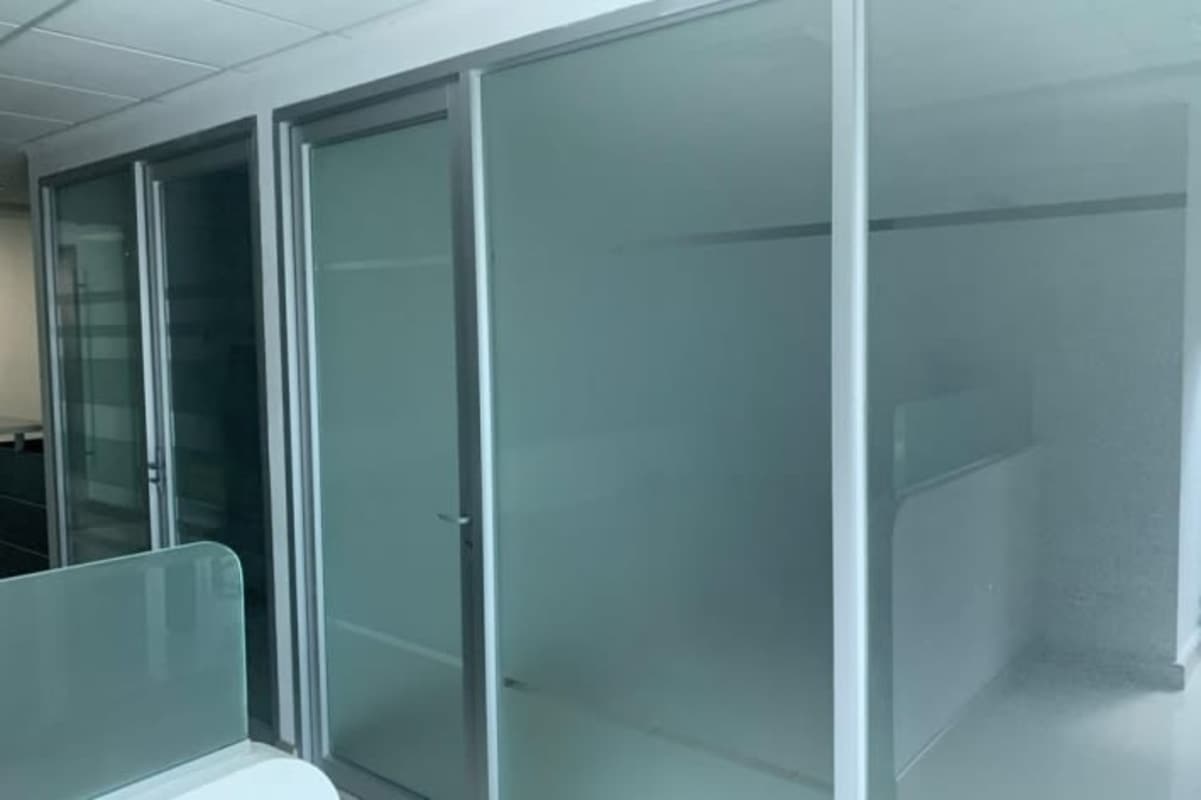 Modern glass-wall private offices in PH Financial Park Panama City