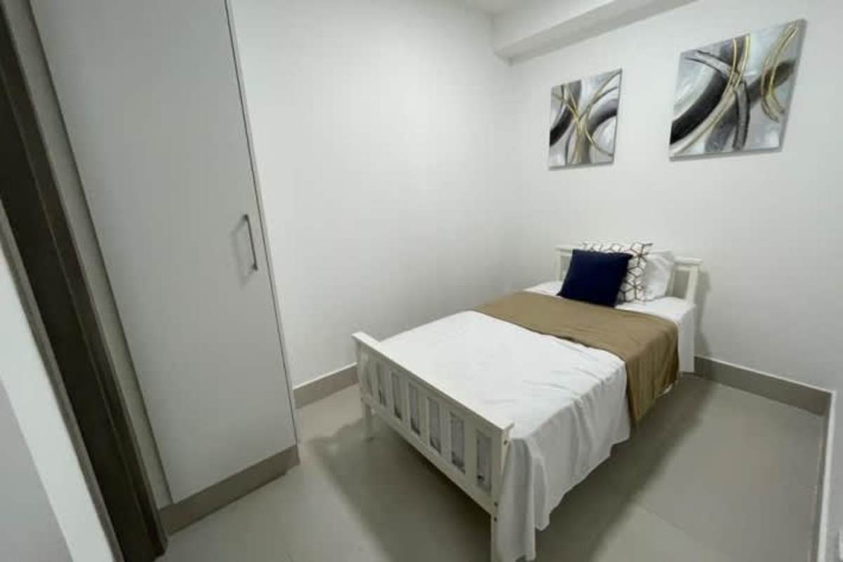 Elegant bathroom with glass shower enclosure PH Midtown El Cangrejo Panama City