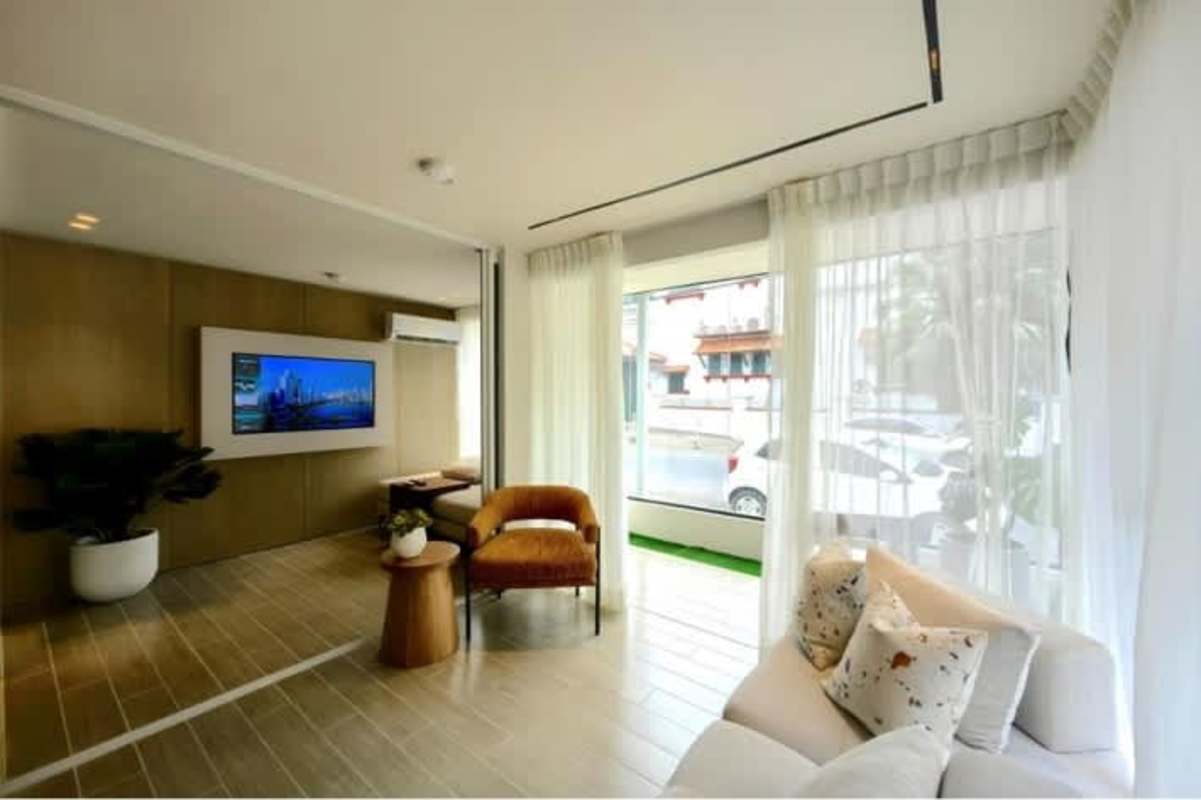 Bright modern living room with balcony PH Armonía pre-sale apartment in Avenida Balboa Panama City