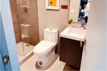 Bathroom with glass-enclosed shower, vanity, contemporary fixtures apartment for rent in Panama Pacifico