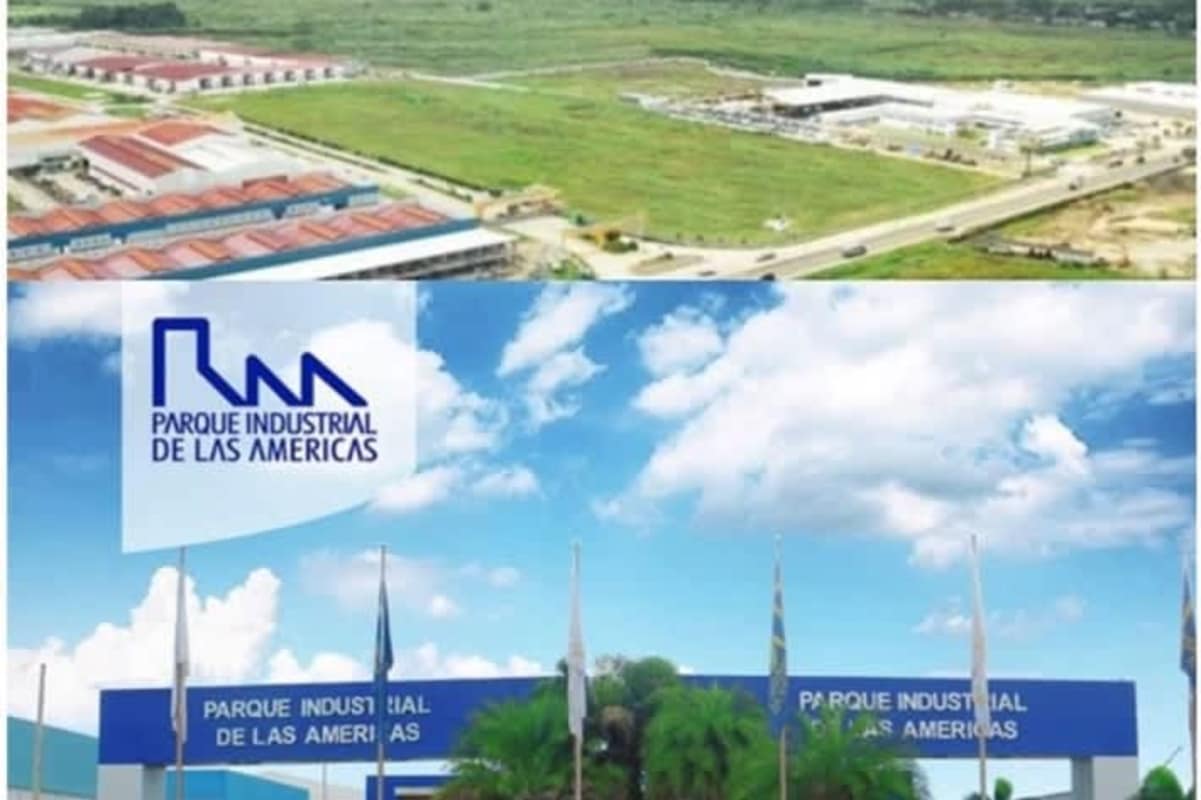 Bird's-eye perspective showing multiple warehouses, entry signage and green landscaping in Panama City