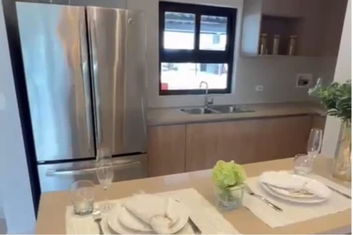 Bedroom with large window and contemporary design in home for sale Costa Sur Panama