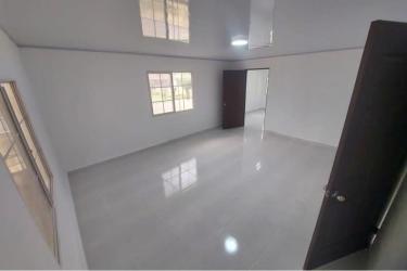 Living room with large windows in affordable La Chorrera Panama house