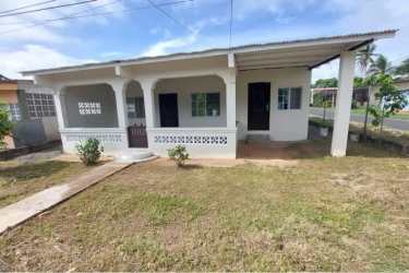 Simple kitchen with open shelving La Chorrera affordable home Panama