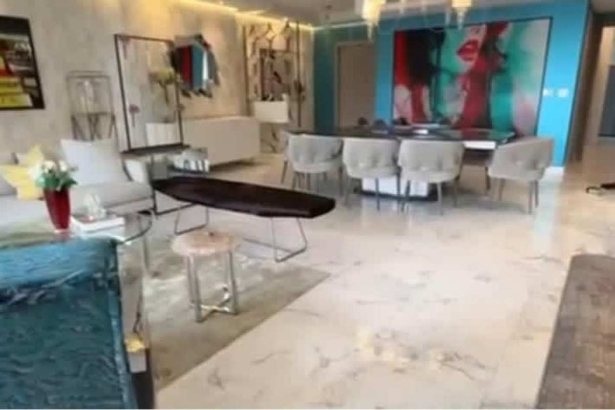 Living area with sliding glass doors to oceanfront balcony PH Breeze Costa del Este City Panama