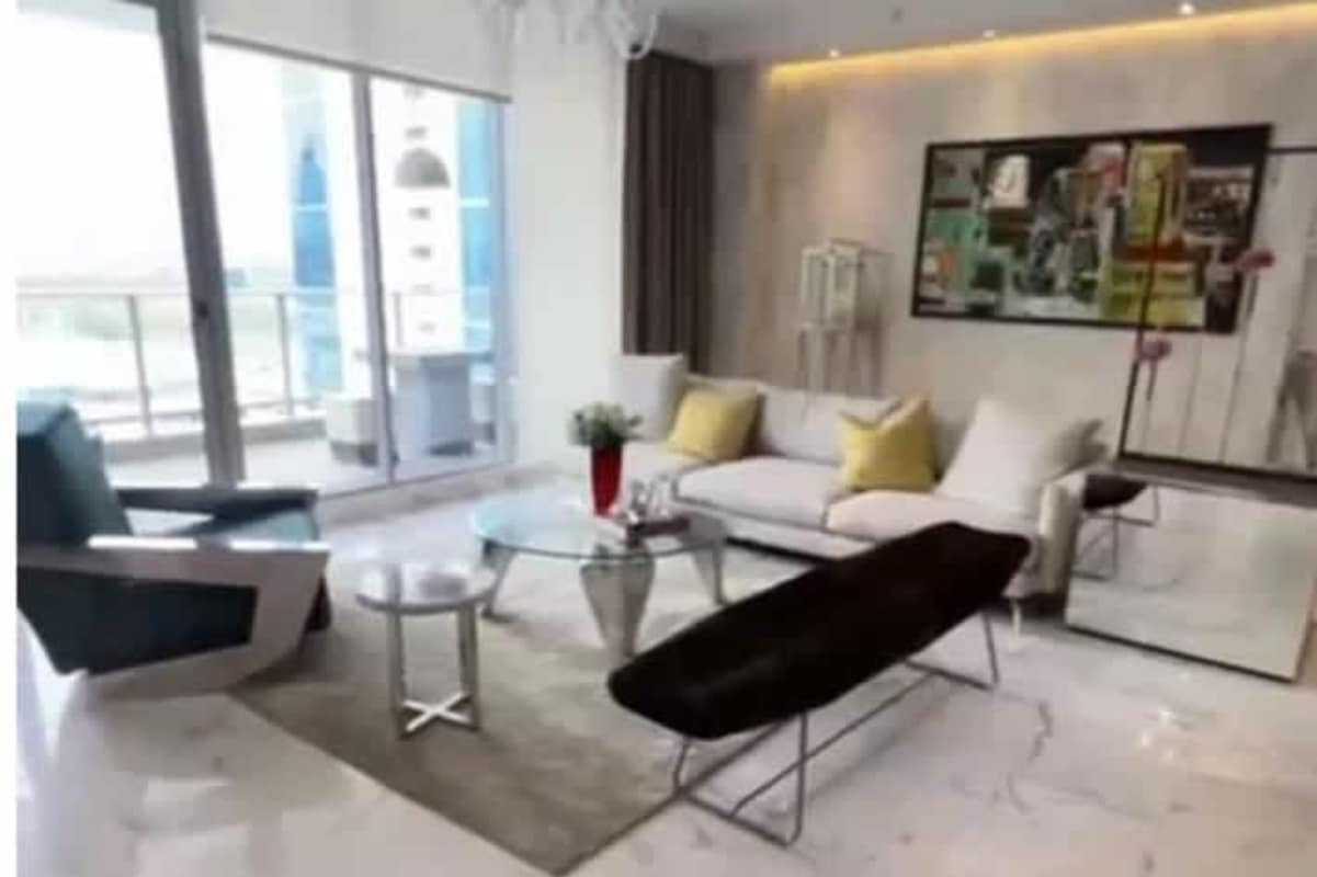 Secondary bedroom city and ocean views floor-to-ceiling windows PH Breeze Costa del Este Panama