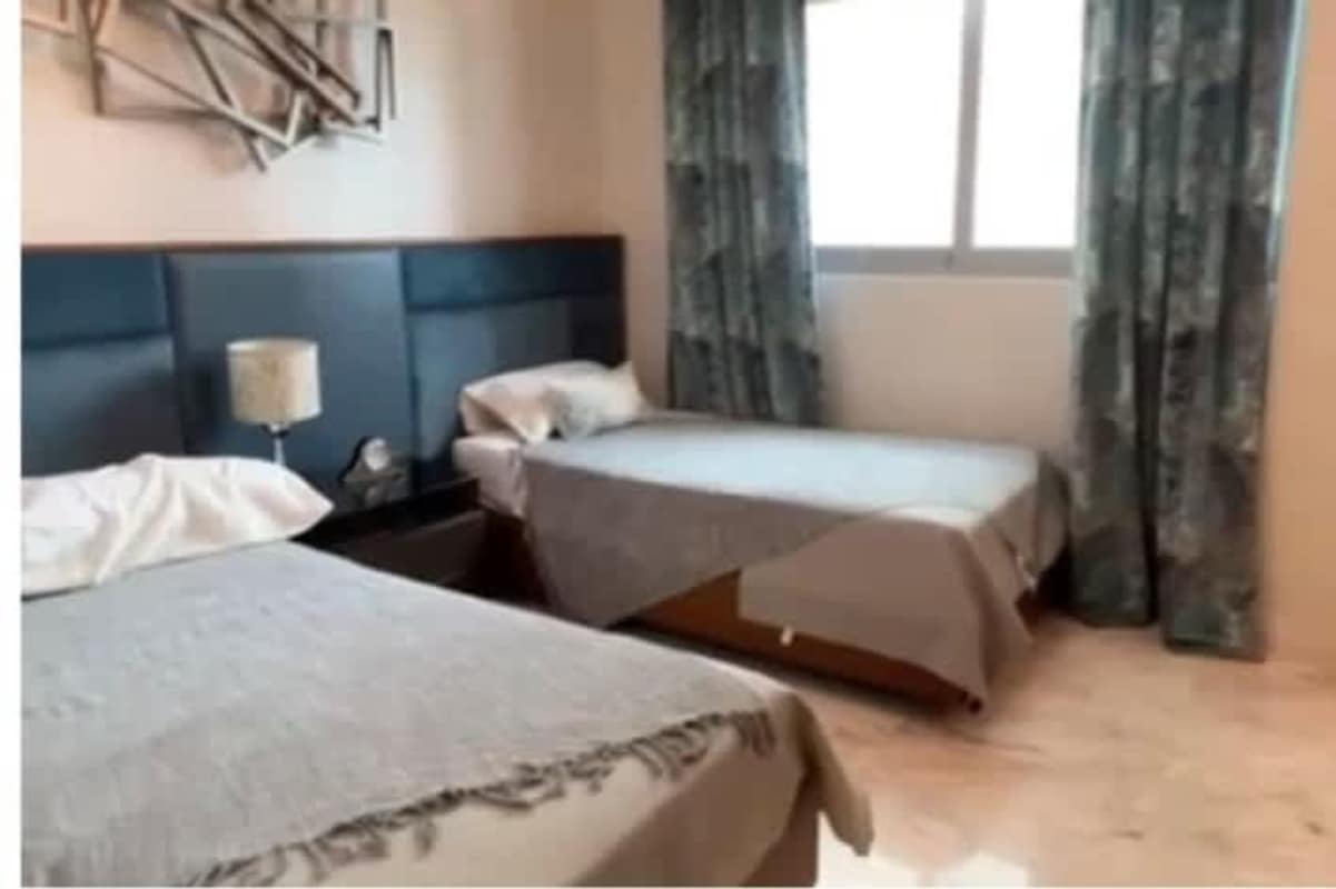 Modern large living room and dining with ocean views floor-to-ceiling windows PH Breeze Costa del Este