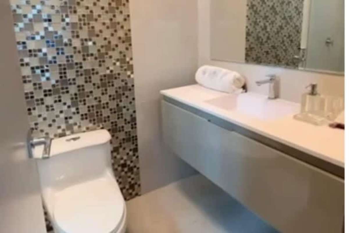 Bathroom with floating vanity mosaic wall PH Breeze Costa del Este Panama