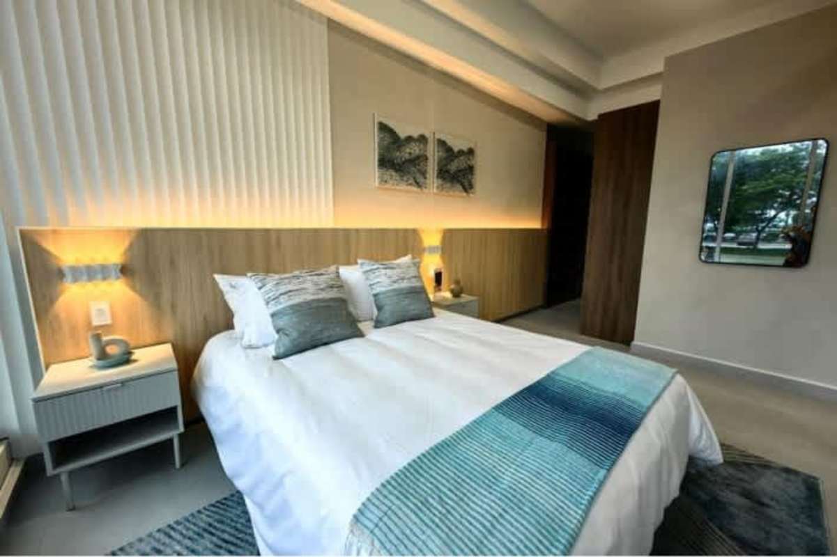 Dining space with modern lighting in Seaside House near Calle Uruguay